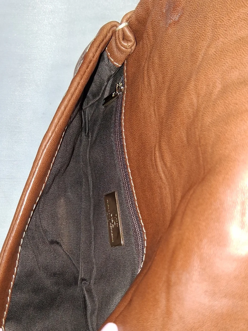 Carolina Herrera glove keather clutch